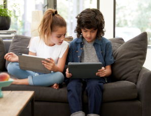Two kids with tablets